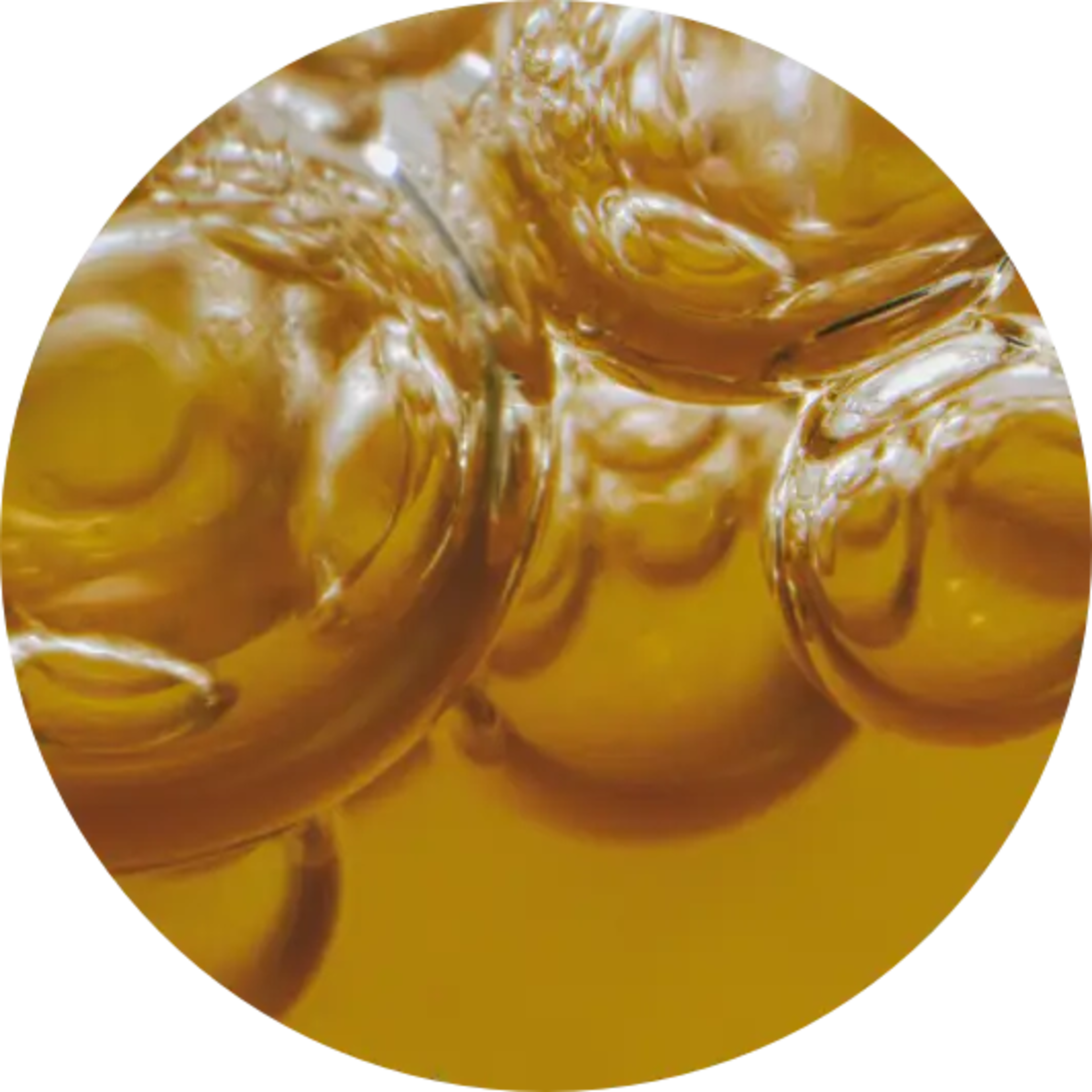 Close-up of golden liquid bubbles.