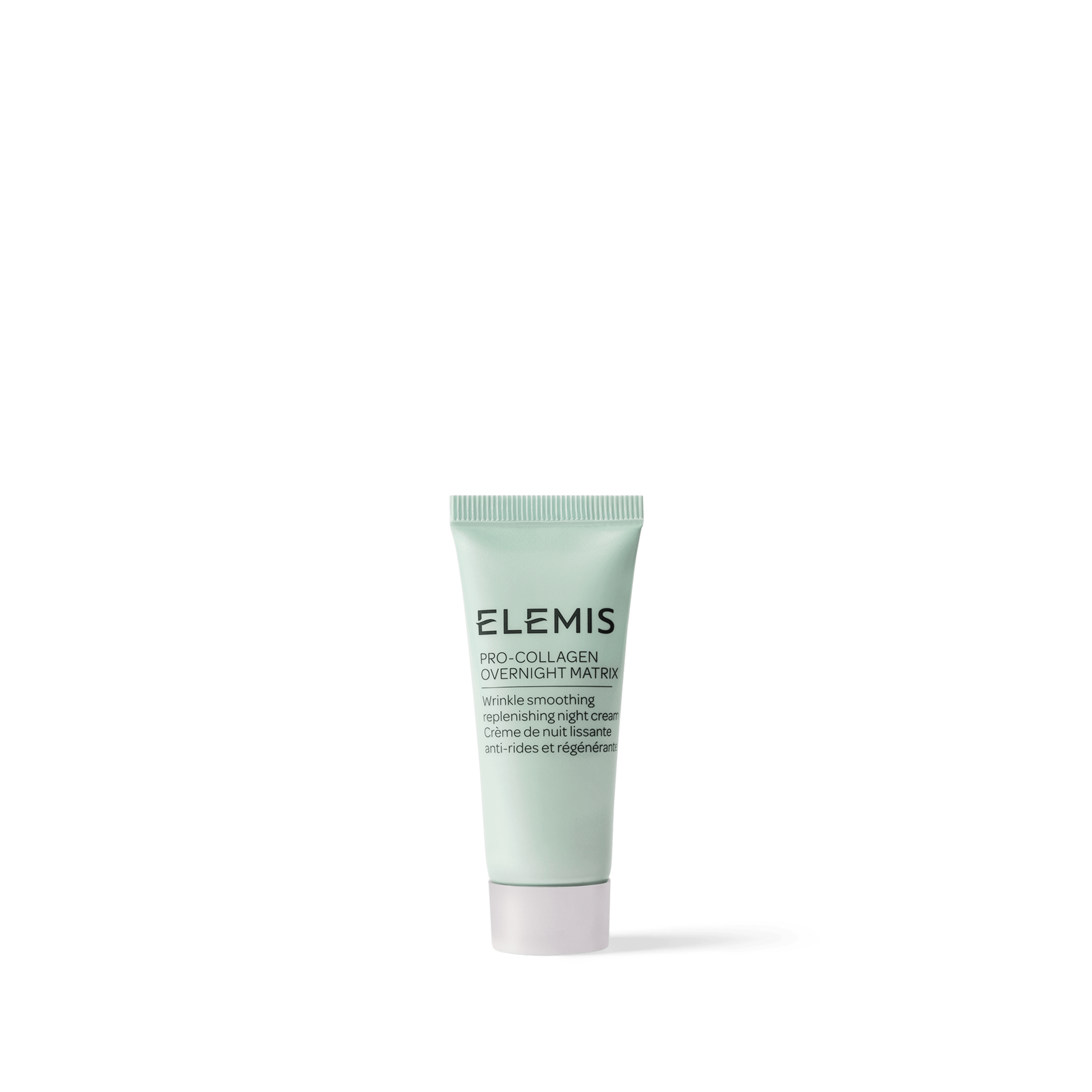 ELEMIS Pro-Collagen Overnight Matrix wrinkle smoothing replenishing night cream in a small pale green tube standing upright on a plain background.