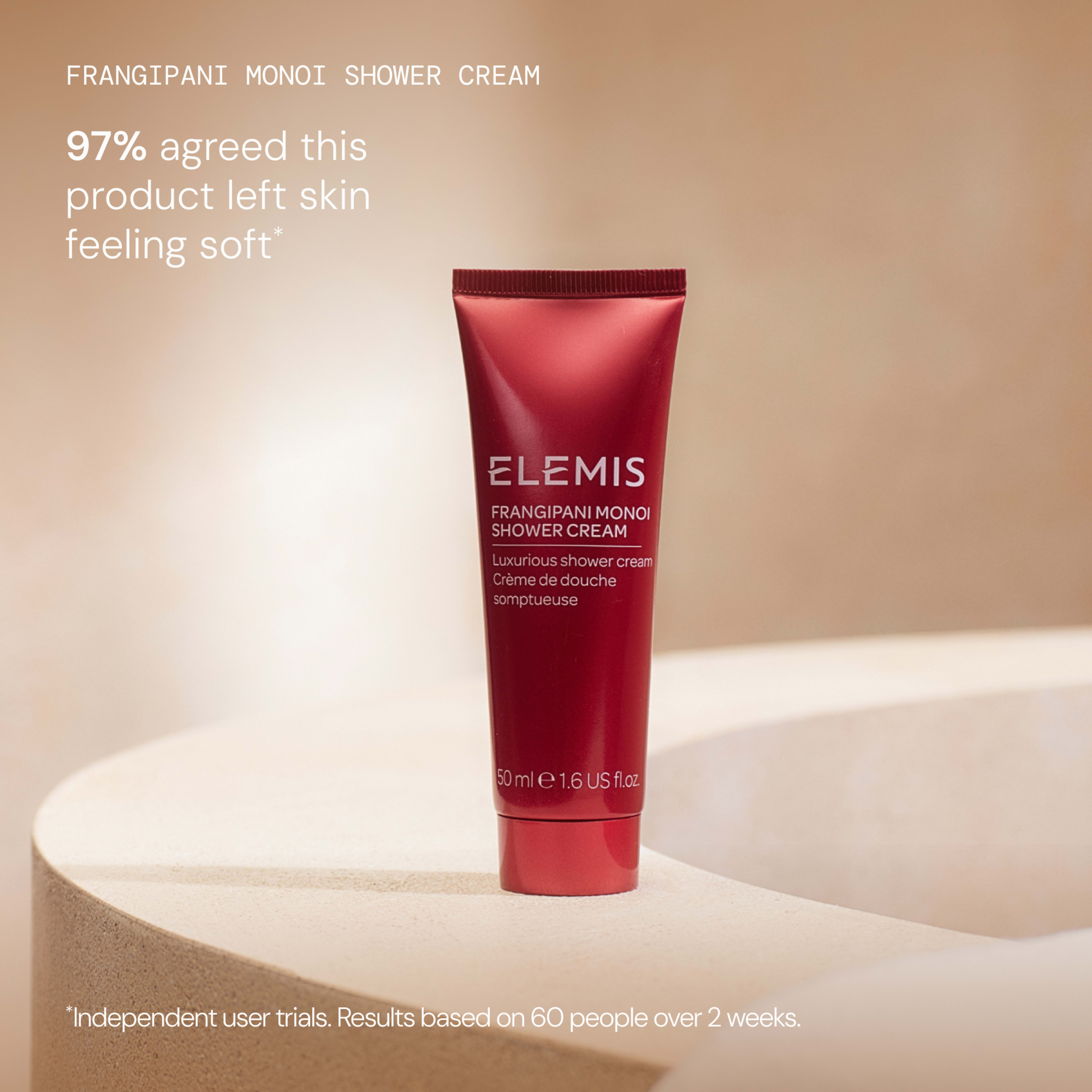 ELEMIS Frangipani Monoi Shower Cream 50ml standing on a curved stone surface against a warm beige background, with text stating “97% agreed this product left skin feeling soft” and a small note about independent user trials over 2 weeks.