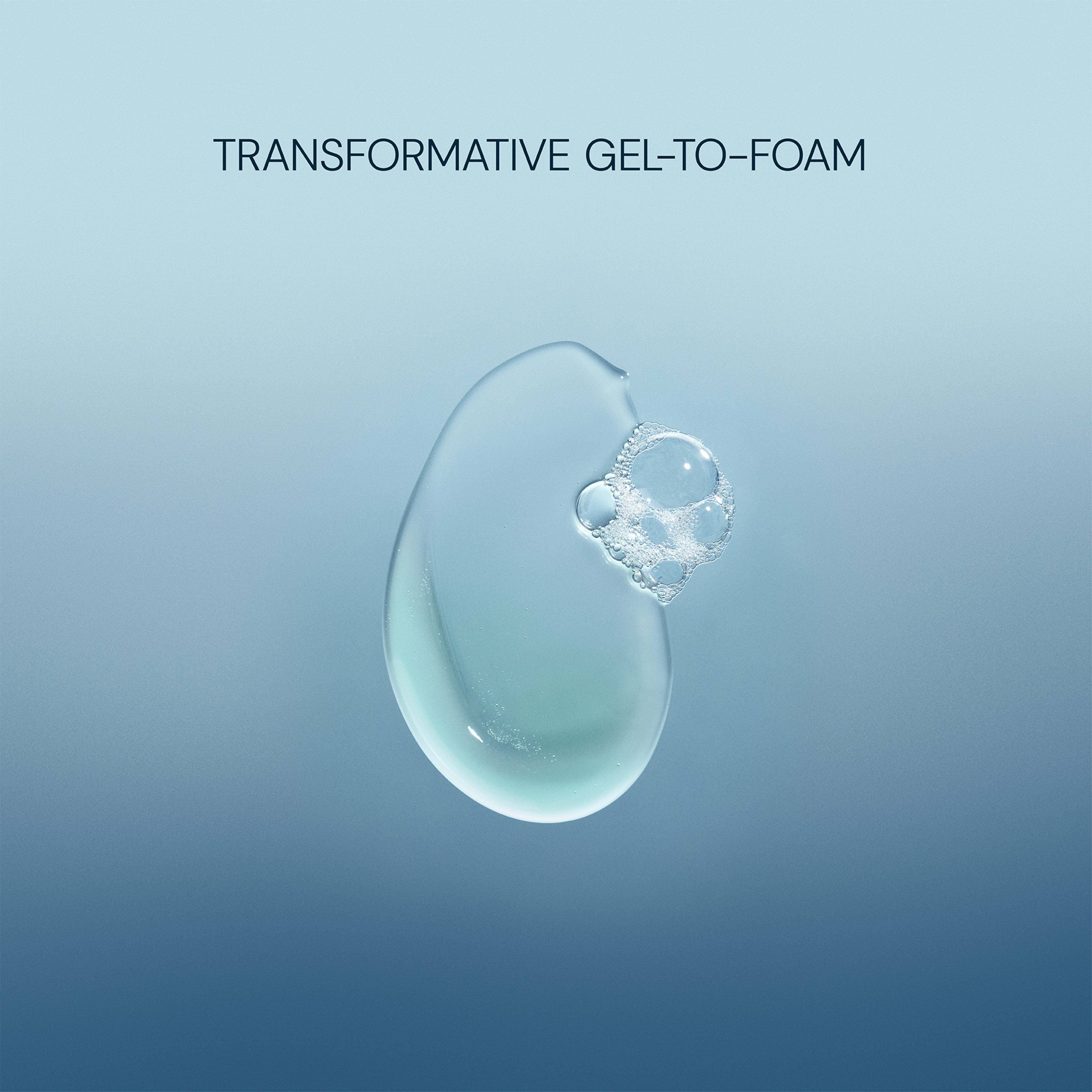 Drop of pale blue gel with small foam bubbles on a blue background, with the text “TRANSFORMATIVE GEL-TO-FOAM” above.