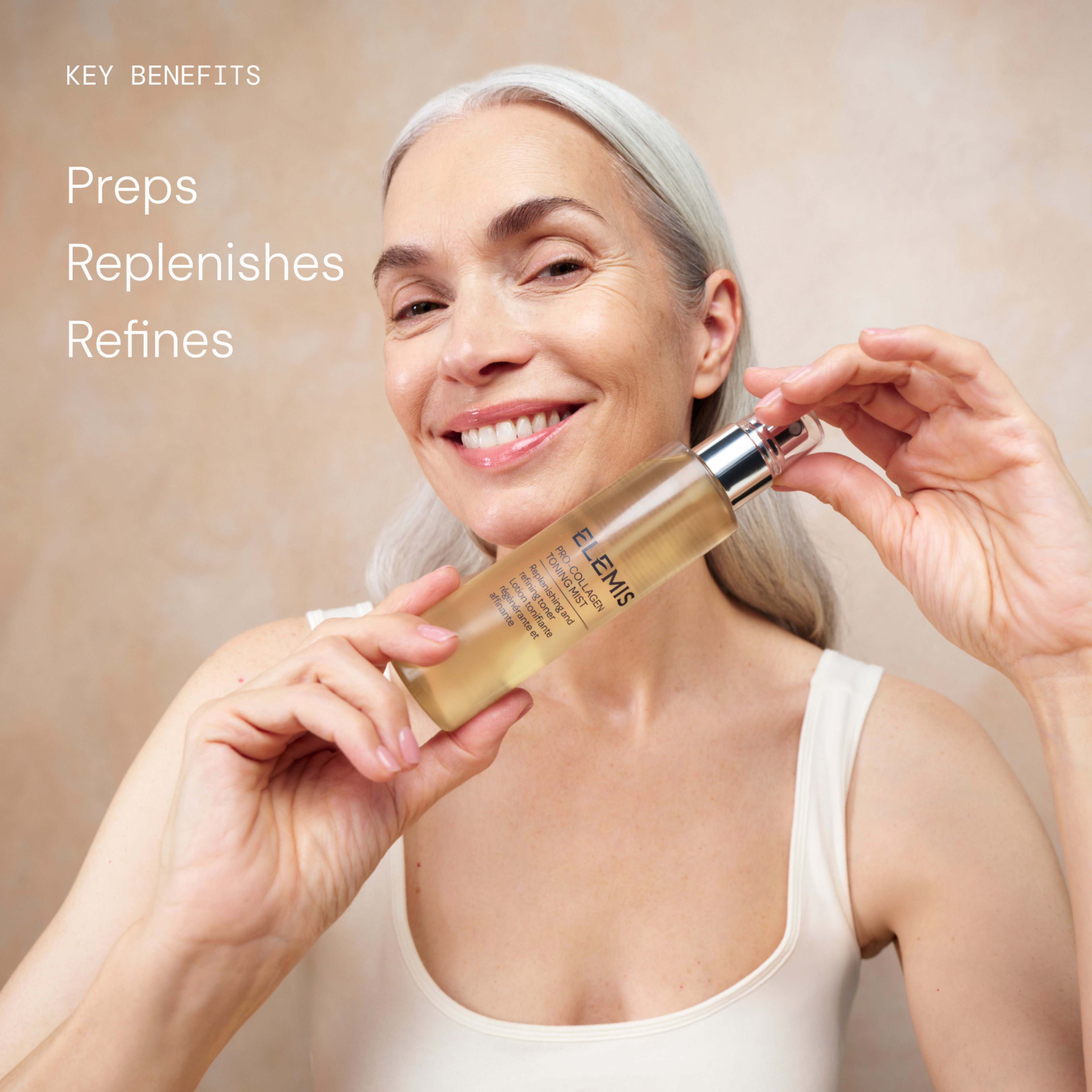 Smiling woman with grey hair holds a bottle of ELEMIS Pro-Collagen Toning Mist close to her face. On the left, text reads: “Key benefits: Preps, Replenishes, Refines.”