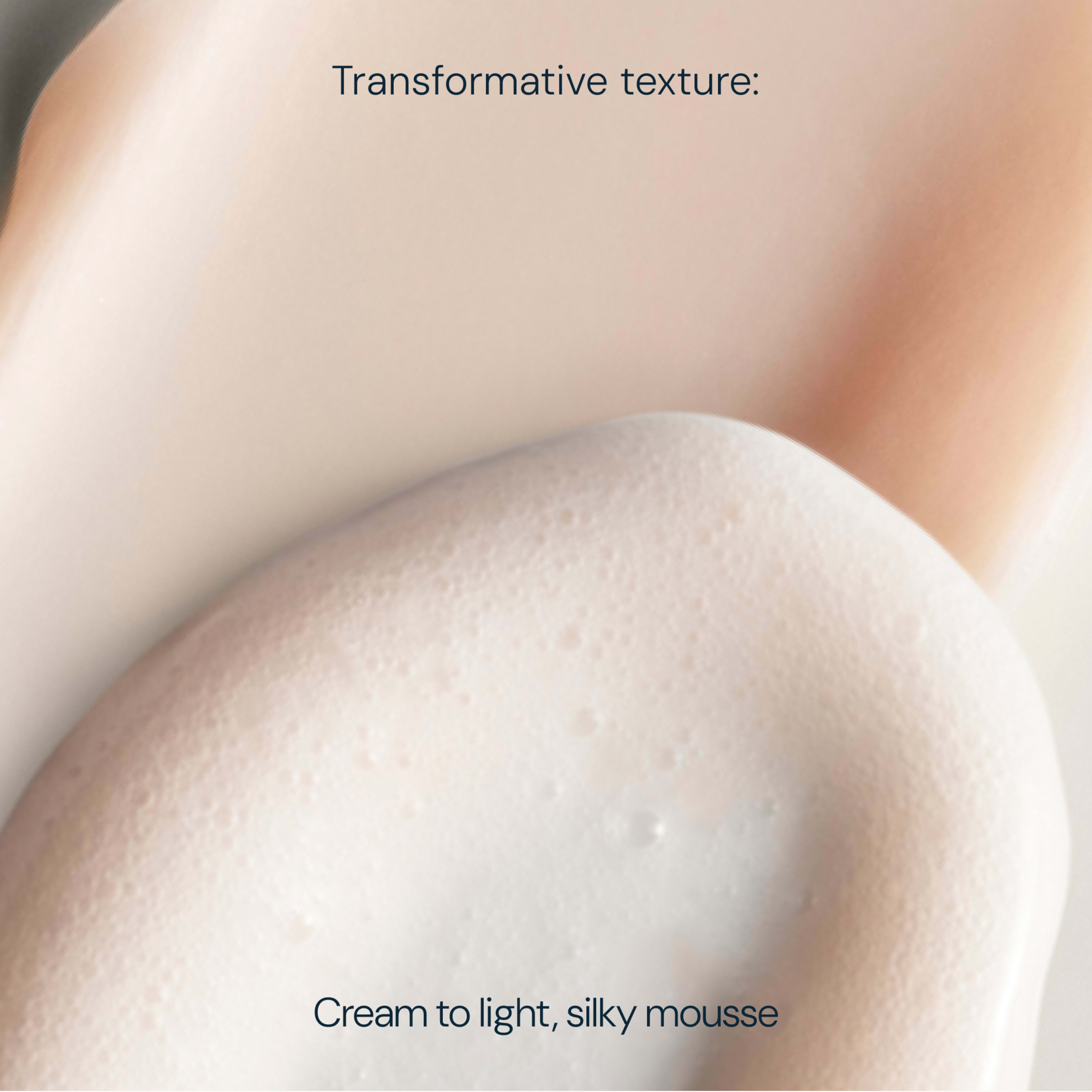 Close-up of soft peach and white product swatches with airy bubbles illustrating a skincare formula changing from cream to light, silky mousse, overlaid with text reading “Transformative texture: Cream to light, silky mousse”.