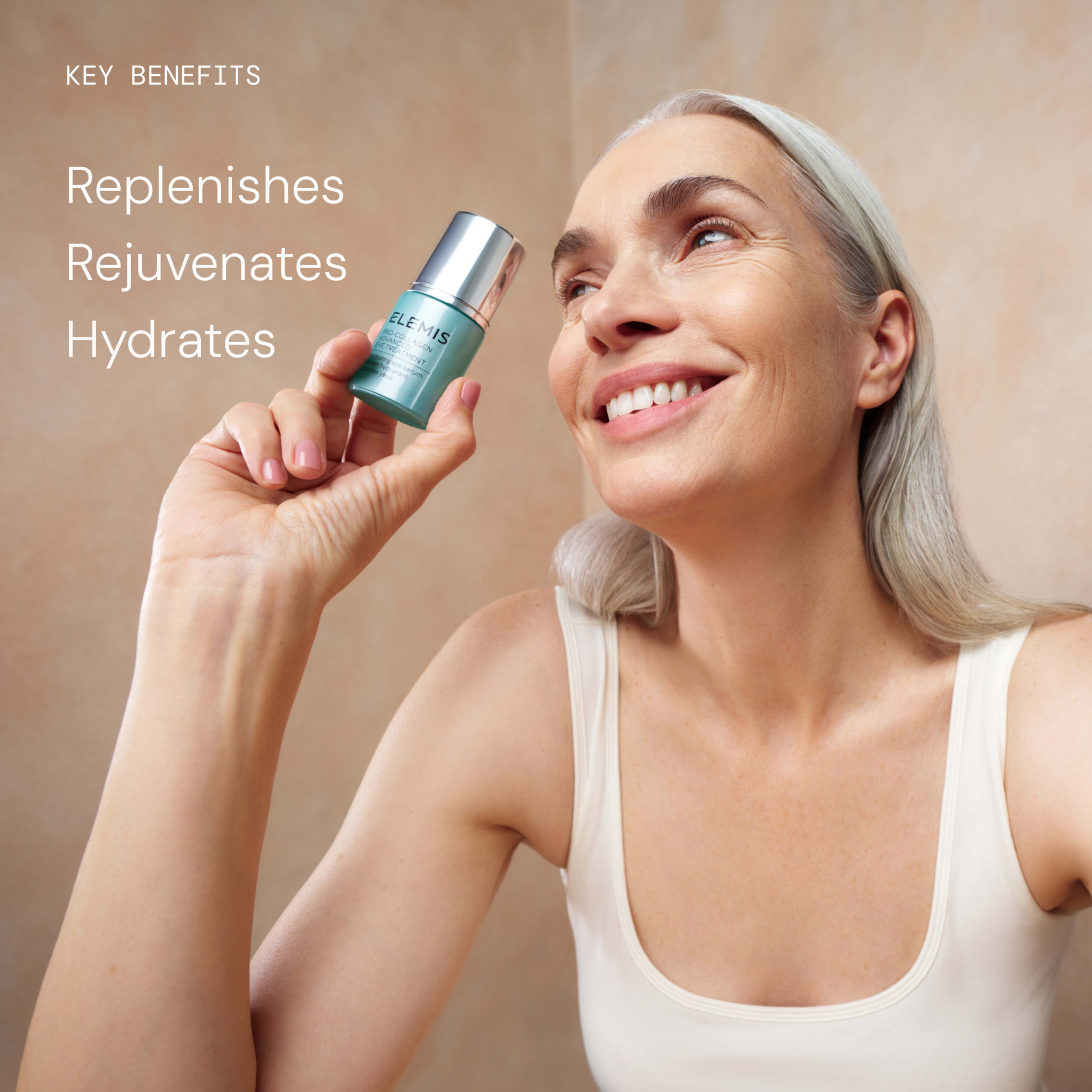 Smiling older woman with silver hair holds a small teal ELEMIS skincare bottle beside her face against a neutral background. On the left, text reads: “Key benefits: Replenishes, Rejuvenates, Hydrates.”