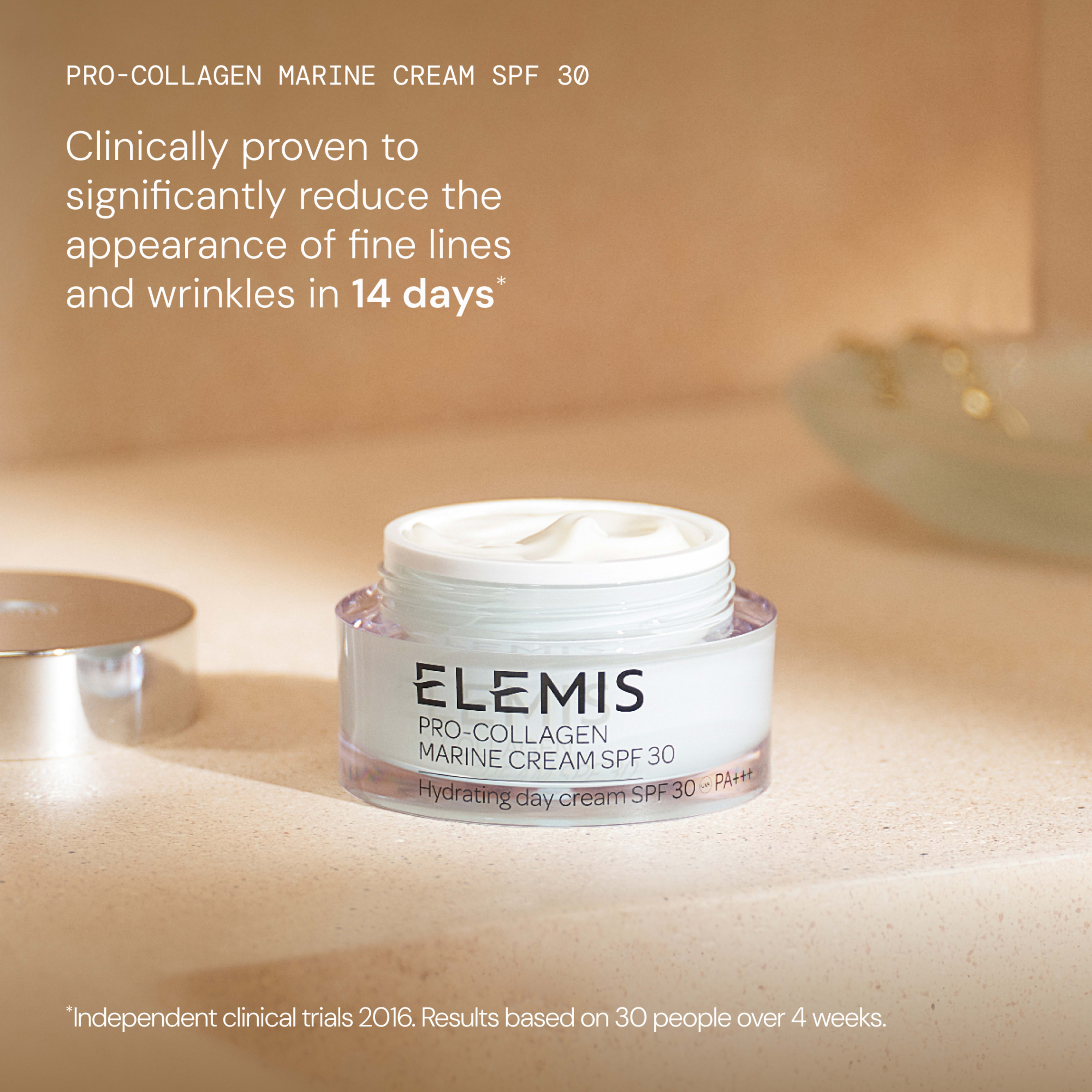 ELEMIS Pro-Collagen Marine Cream SPF 30 jar on a beige surface with soft lighting. On-image text says it is clinically proven to significantly reduce the appearance of fine lines and wrinkles in 14 days, based on independent clinical trials in 2016.