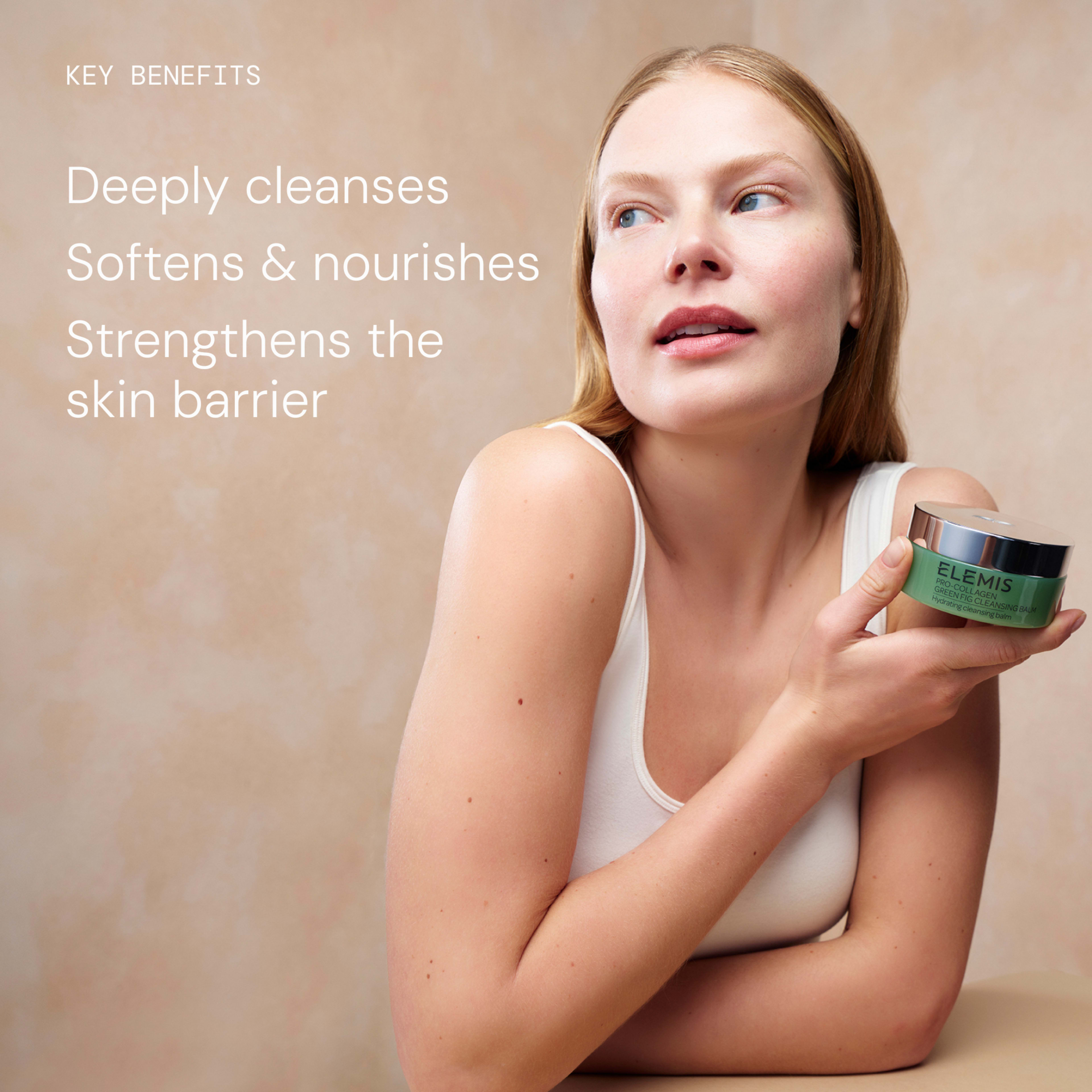 Woman in a white vest holds a jar of ELEMIS cleanser, looking off camera against a soft beige background. On the left, text reads: “Key benefits: Deeply cleanses, softens & nourishes, strengthens the skin barrier.”
