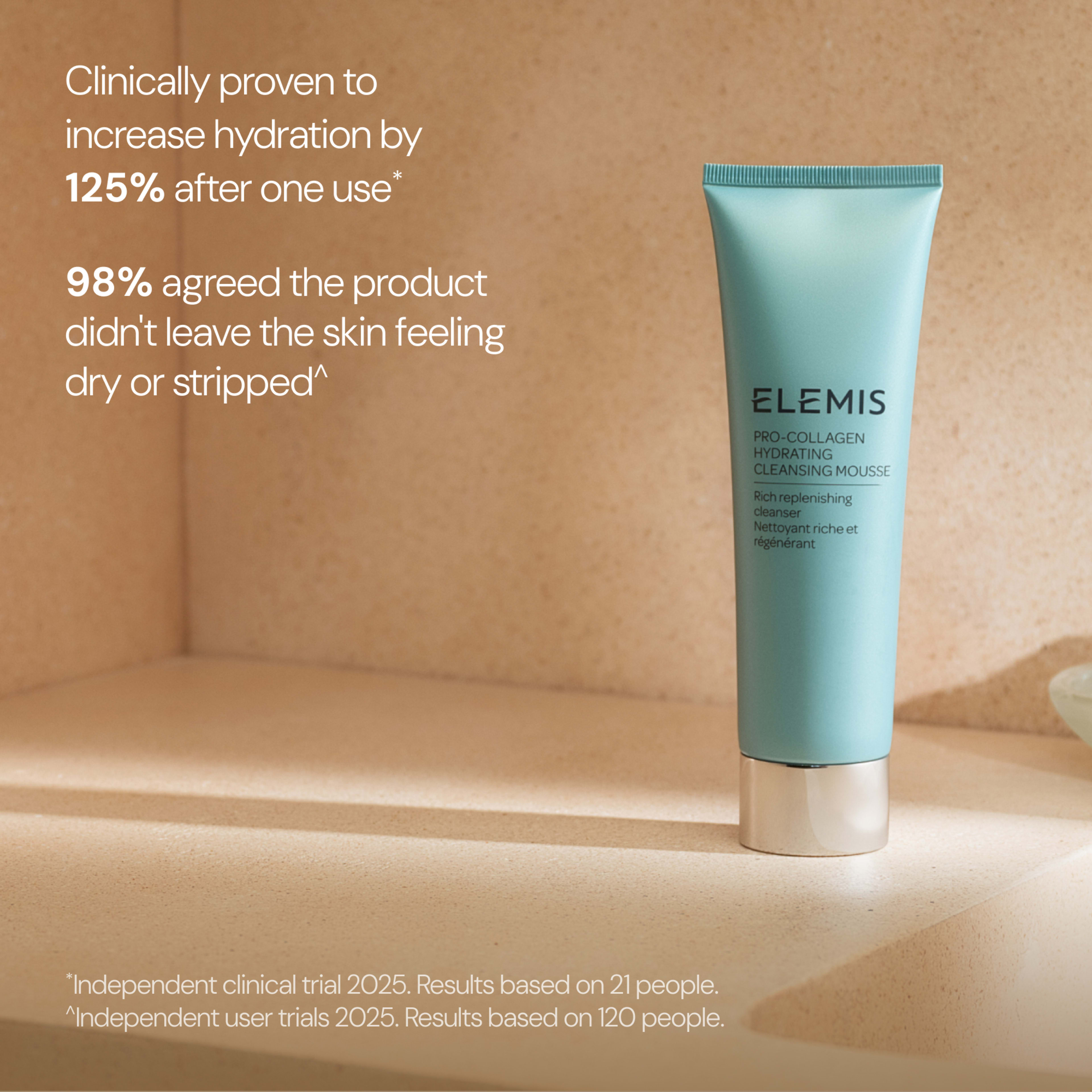 ELEMIS Pro-Collagen Hydrating Cleansing Mousse tube on a bathroom surface with text stating it is clinically proven to increase hydration by 125% after one use and that 98% agreed it did not leave skin feeling dry or stripped, with 2025 trial footnotes.