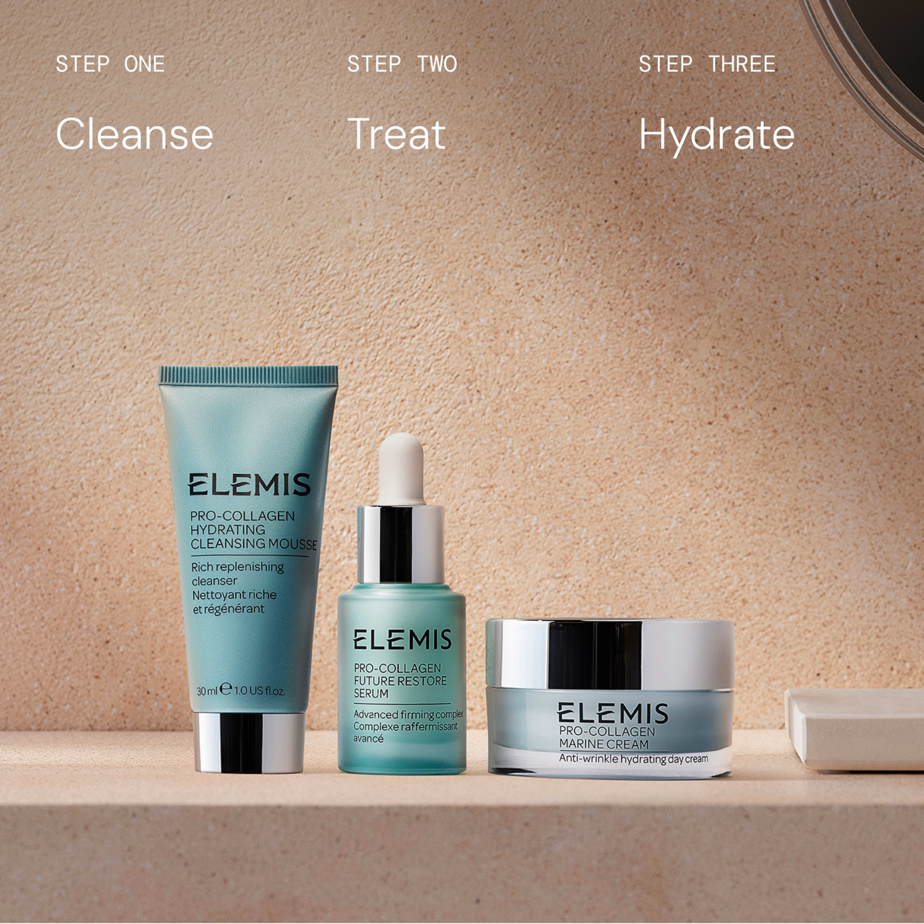 Three ELEMIS Pro-Collagen products on a bathroom shelf under the text "Step one Cleanse, Step two Treat, Step three Hydrate". From left to right: Hydrating Cleansing Mousse, Future Restore Serum and Marine Cream.