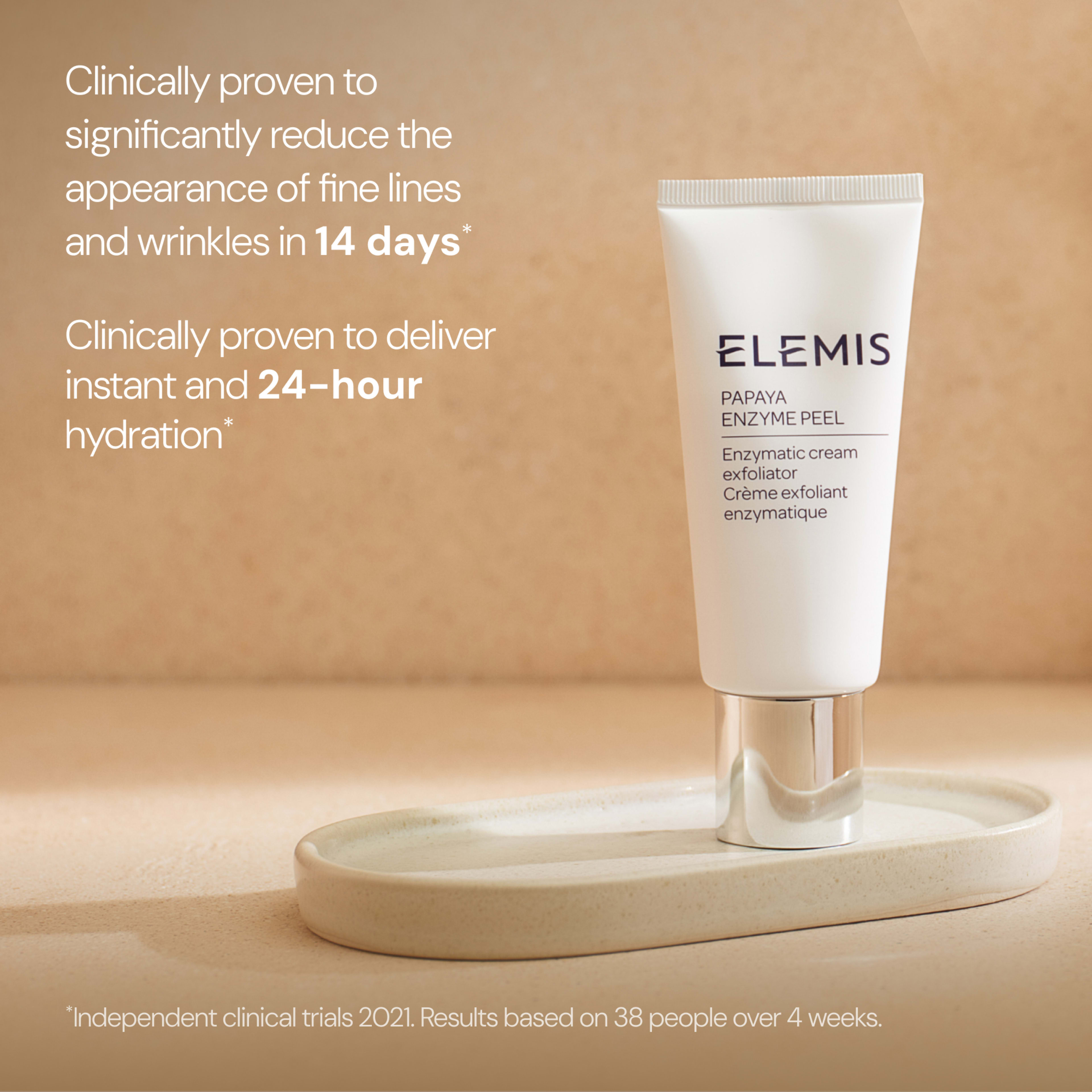 ELEMIS Papaya Enzyme Peel tube standing on a ceramic tray against a beige background, with claims that it is clinically proven to significantly reduce fine lines and wrinkles in 14 days and deliver instant and 24-hour hydration, based on a 2021 clinical trial.
