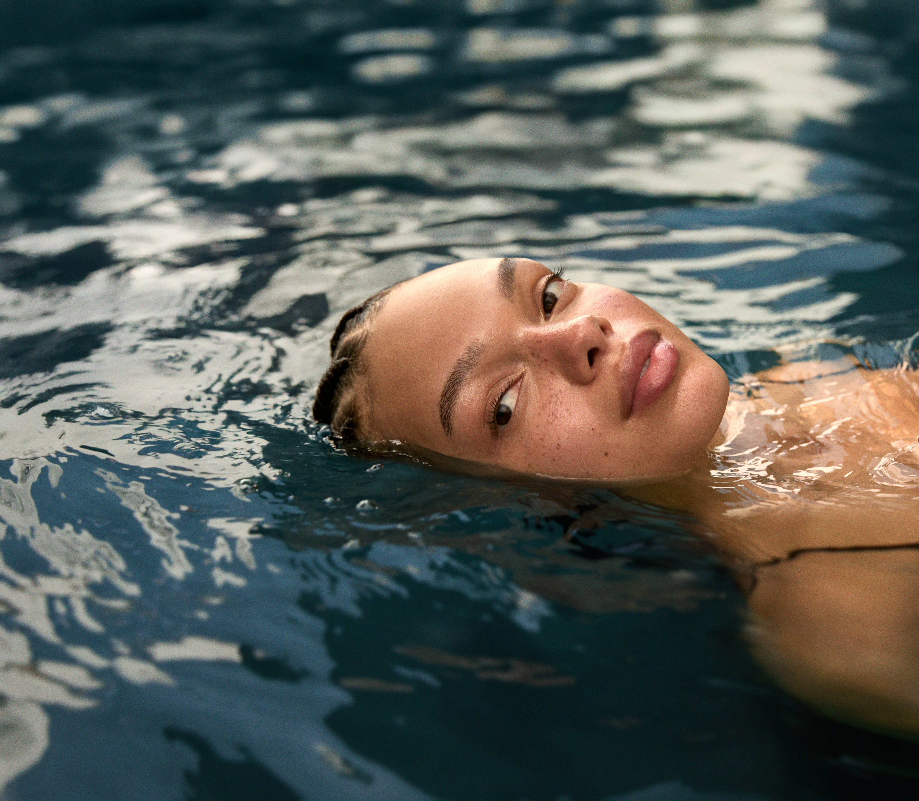 Woman floating in water